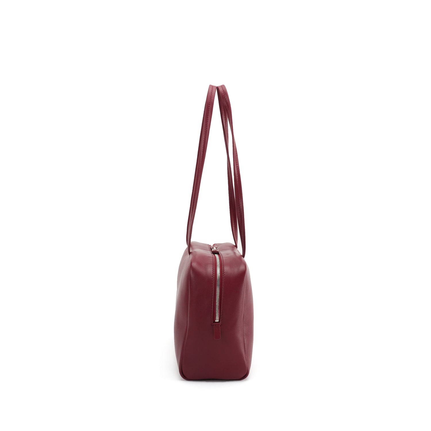 Burgundy east-west bowling tote side profile with long leather handles OEM wholesale product detail