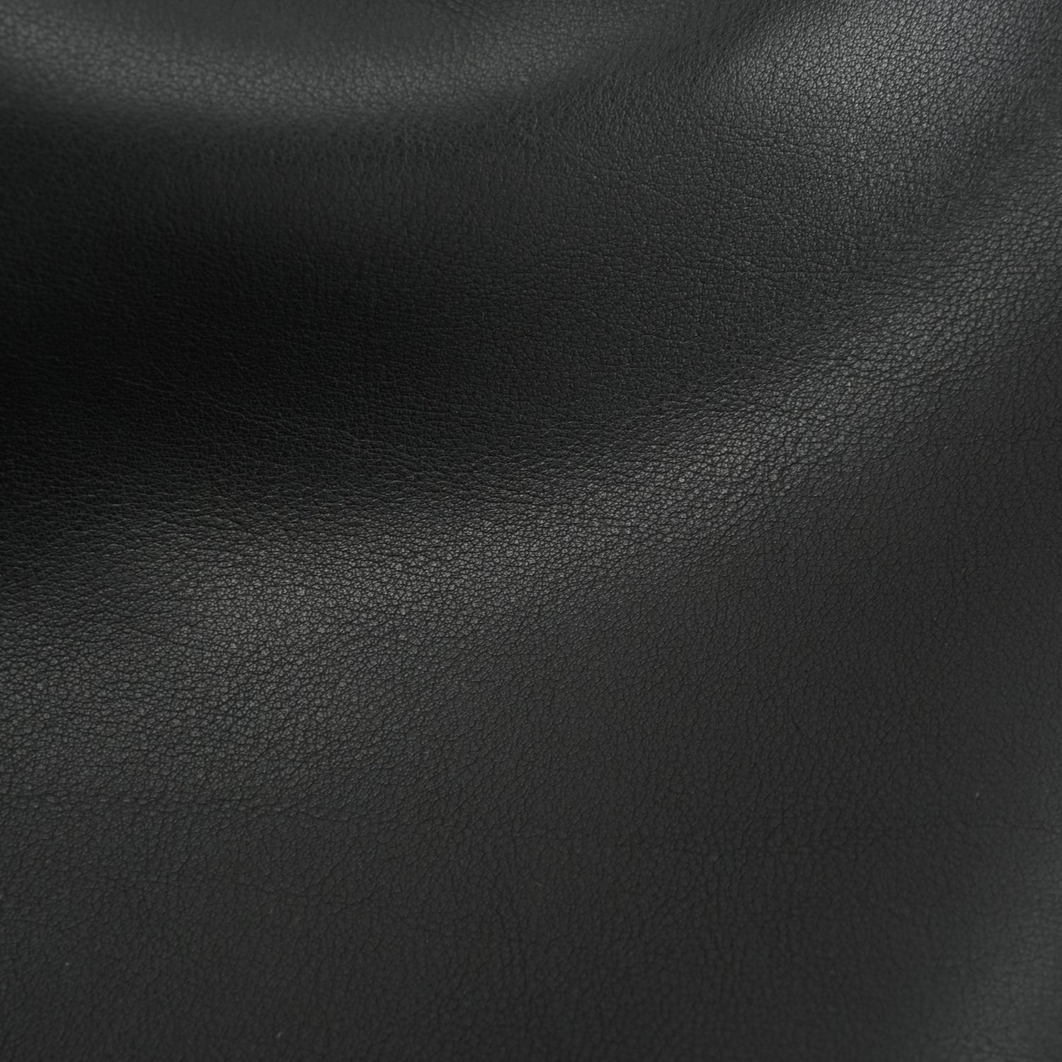 Black smooth leather surface close-up for soft east-west tote OEM wholesale product detail